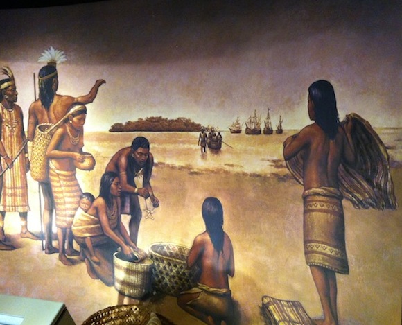 Painting of Spanish making commerce with indigenous - Museo del Oro Precolombino - San José, Costa Rica
